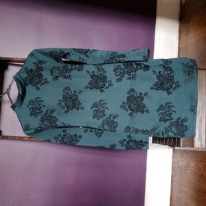 Green body con mini dress with long sleeves